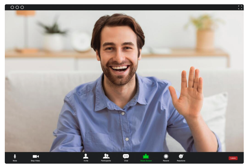 A candidate greeting the panel at the start of a video interview